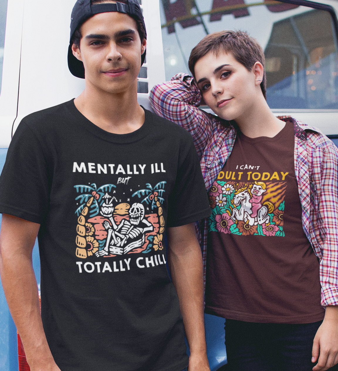 couple-wearing-different-round-neck-funny t-shirts-against-a-blue-van